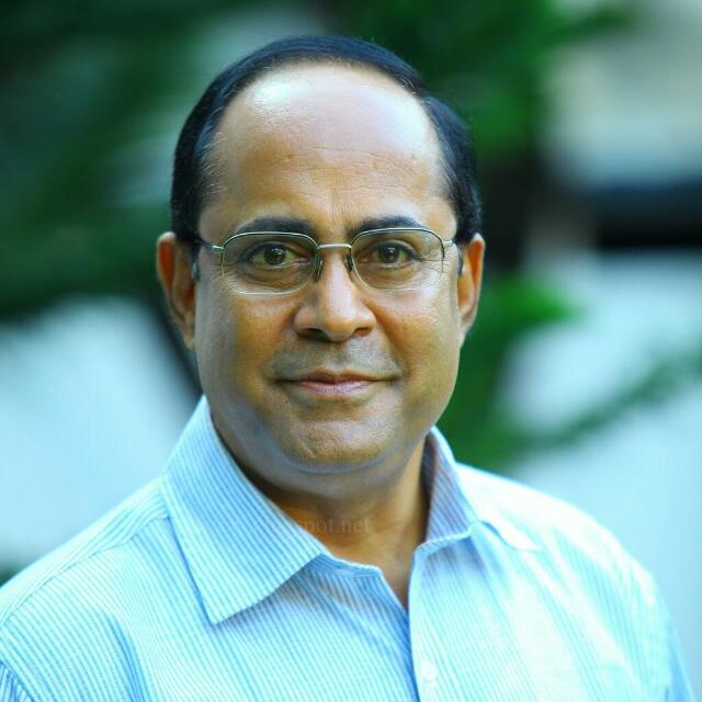 DINESH PANIKER